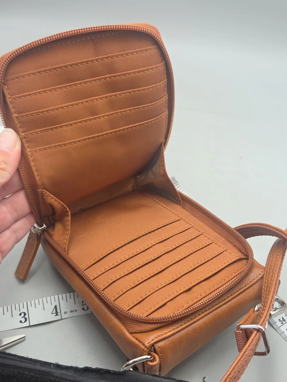 Hammacher Schlemmer • Wearable crossbody leather wallet